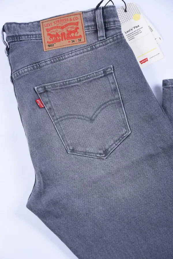 👖 Jean Levi’s – Coupe Normale Couleurs : Noir · Bleu foncé · Bleu clair · Brut · Gris