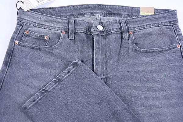 👖 Jean Levi’s – Coupe Normale Couleurs : Noir · Bleu foncé · Bleu clair · Brut · Gris